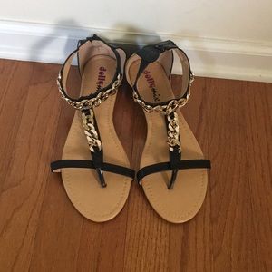 Flat black sandals